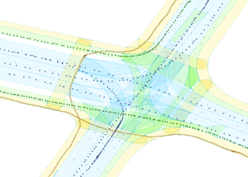 A sample of trajectories from the LiDAR system with our lane-accurate digital map in the background. Blue = vehicle, green = cyclist, yellow = pedestrian.